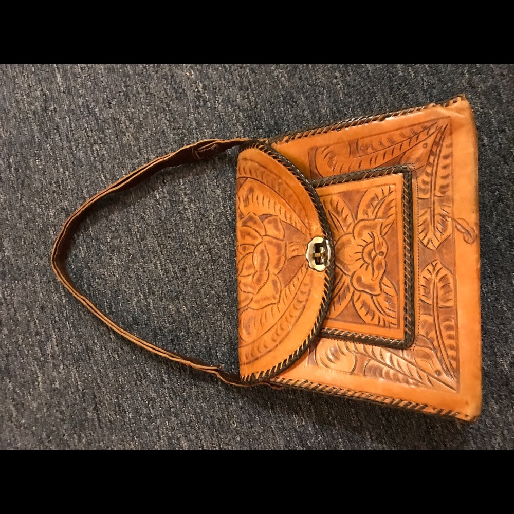 carved leather purse